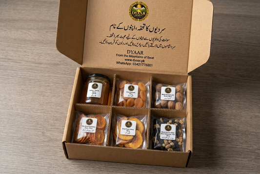 Dyaar six-compartment winter gift box with added dried peach and mixed toot